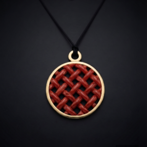 Pendente "Intrecci" corallo rosso del Mediterraneo e argento 925/1000 dorato